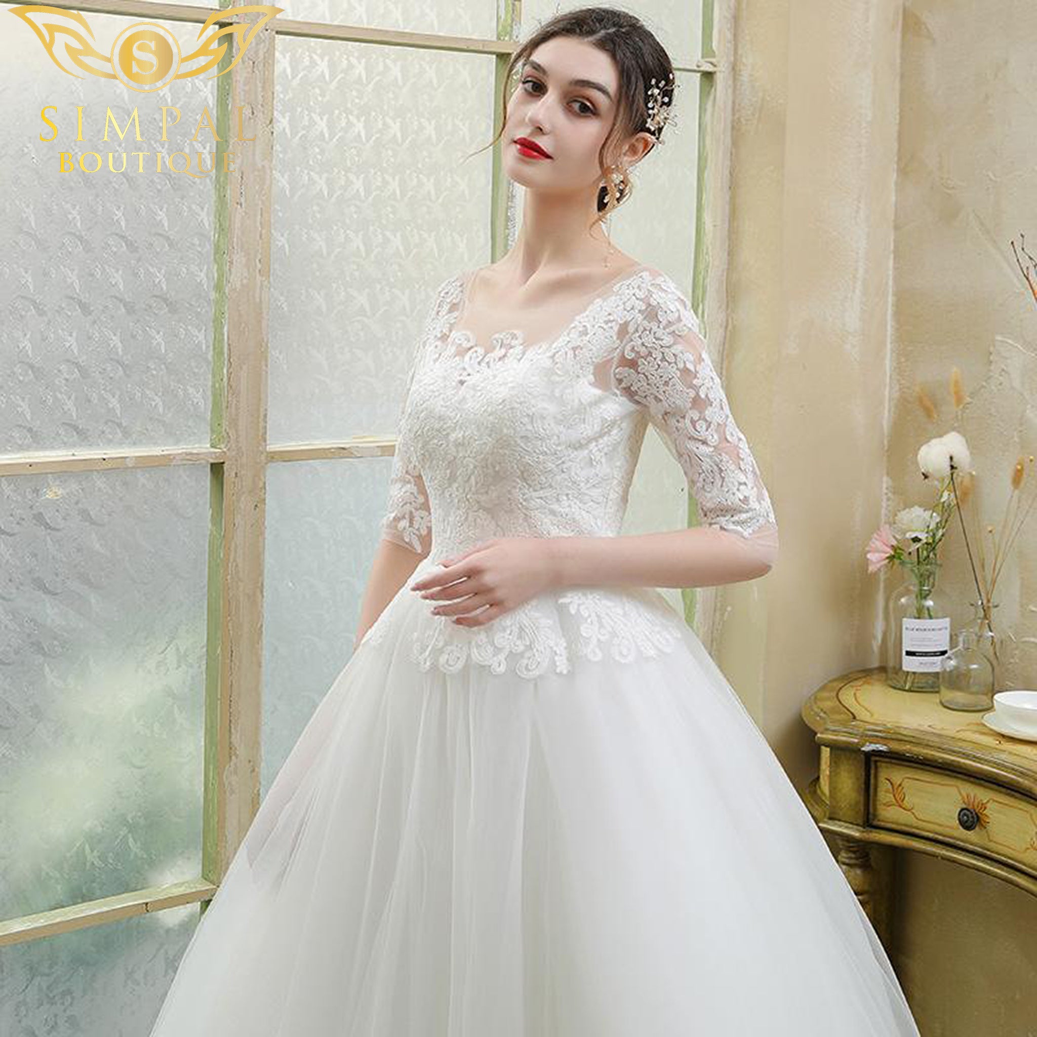 In Store Brides longsleeved forest lace wedding dress