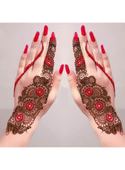 Swooshes and Delicious Dots using a mehndi/henna cone. Credit to