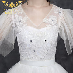 In Store Reez Studio Covering Arms Master Wedding Dress