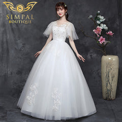 In Store Reez Studio Covering Arms Master Wedding Dress